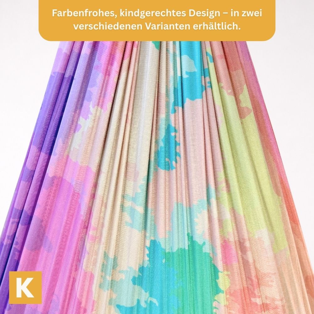 Detailaufnahme der Flow Schaukel 2.0 Rainbow Grey mit mehrfarbigem Stoff in sanften Regenbogentönen